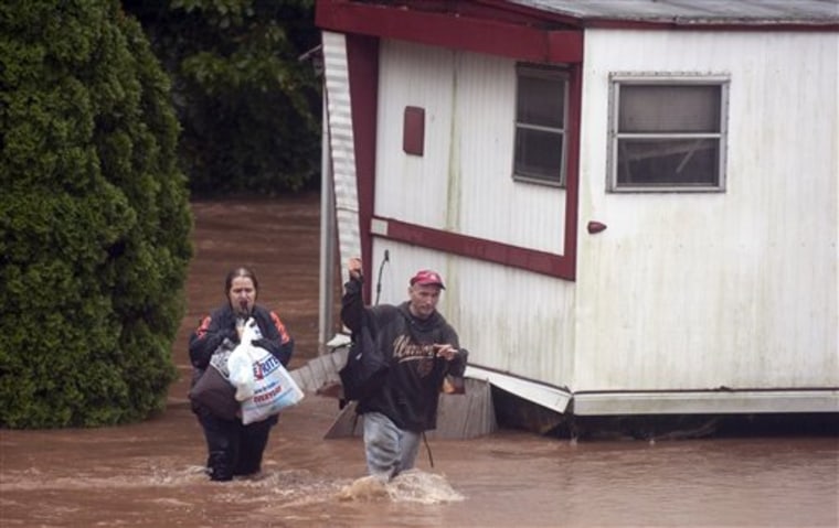 Residents are evacuated from their mobile home park along Zimmy's Drive in Conewago Township, Pa., Wednesday, Sept. 7, 2011. The remnants of slow-moving Tropical Storm Lee were dumping more rain this week on an already waterlogged Pennsylvania, with forecasters warning residents across the state to brace for more potential flooding. (AP Photo/York Daily Record/Sunday News, Paul Kuehnel)